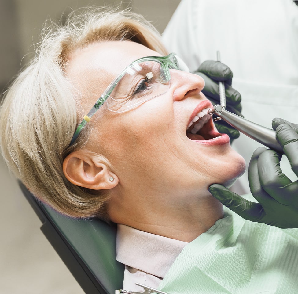 mature woman getting root canal